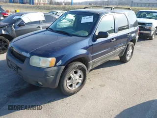 2003 Ford Escape XLT Popular 2 with VIN 1FMYU93103KE17610, listed as a IAAI auction lot 41766806 with 1 mi miles. Bid and sale history available at carsss.com. Image 2.