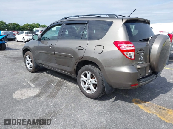 2012 Toyota RAV4 with VIN 2T3BF4DV4CW237305, listed as a IAAI auction lot 41590091 with 114,757 mi miles and . Bid and sale history available at carsss.com. Image 3.