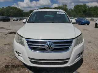 2011 Volkswagen Tiguan SEL w/Premium Navi z VIN WVGAV7AX1BW540155, wystawiony jako Copart lot #56483975 z przebiegiem 137 970 mil mil oraz Czysty tytuł • Clean title. Historia ofert i sprzedaży dostępna na DreamBid. Obrazek 5.