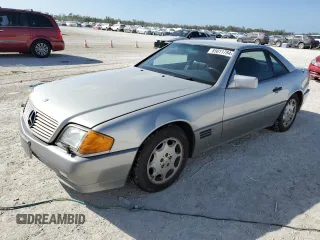 1991 MERCEDES-BENZ SL-CLASS SL with VIN WDBFA61E1MF022918, listed as a Copart auction lot 85011784 with 262,144 mi miles and Salvage Title. Bid and sale history available at DreamBid. Image 1.