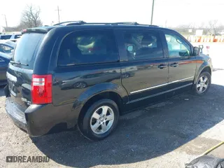 2010 Dodge Grand Caravan SXT with VIN 2D4RN5D18AR233143, listed as a IAAI auction lot 41880502 with 145,356 mi miles. Bid and sale history available at carsss.com. Image 4.