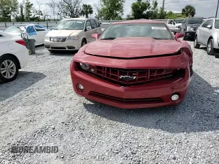2013 Chevrolet Camaro LT z VIN 2G1FB1E37D9110867, wystawiony jako Copart lot #54696005 z przebiegiem 153 437 mil mil oraz Szkoda całkowita • Salvage title. Historia ofert i sprzedaży dostępna na DreamBid. Obrazek 13.