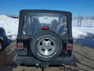 1999 Jeep Wrangler Sport with VIN 1J4FY19SXXP456810, listed as a IAAI auction lot 41725834 with 93,151 mi miles. Bid and sale history available at carsss.com. Image 16.
