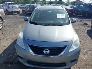 2014 Nissan Versa SV with VIN 3N1CN7AP5EL809218, listed as a IAAI auction lot 42096891 with 87,559 mi miles. Bid and sale history available at carsss.com. Image 6.
