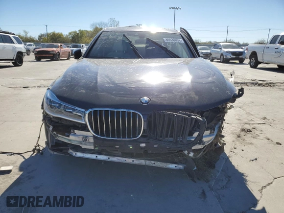 2018 BMW 7 Series 750i with VIN WBA7F0C50JGM23350, listed as a Copart auction lot 80530694 with 0 mi miles and Salvage Title. Bid and sale history available at carsss.com. Image 5.