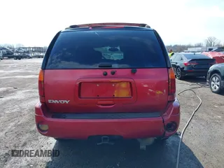 2005 GMC Envoy SLE with VIN 1GKDT13S252127604, listed as a IAAI auction lot 41898390 with 210,655 mi miles. Bid and sale history available at carsss.com. Image 16.