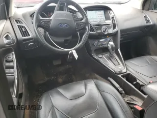 2017 Ford Focus Titanium z VIN 1FADP3N29HL240527, wystawiony jako Copart lot #62891695 z przebiegiem 126 926 mil mil oraz Szkoda całkowita • Salvage title. Historia ofert i sprzedaży dostępna na DreamBid. Obrazek 8.