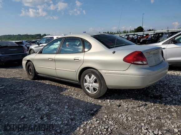 2005 Ford Taurus SE with VIN 1FAFP53U95A101336, listed as a Copart auction lot 56457095 with 127,656 mi miles and Salvage title. Bid and sale history available at DreamBid. Image 2.
