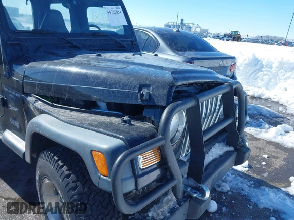 1999 Jeep Wrangler Sport with VIN 1J4FY19SXXP456810, listed as a IAAI auction lot 41725834 with 93,151 mi miles. Bid and sale history available at carsss.com. Image 6.