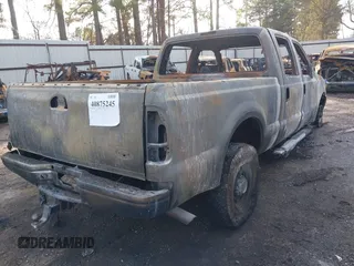 2003 Ford Super Duty F-250 XL with VIN 1FTNW21F73EA07702, listed as a IAAI auction lot 40875245 with 1 mi miles. Bid and sale history available at carsss.com. Image 4.