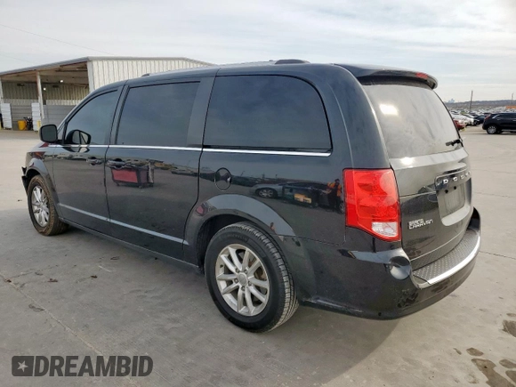 2019 Dodge Grand Caravan SXT with VIN 2C4RDGCG9KR662312, listed as a Copart auction lot 48182105 with 191,199 mi miles and Salvage Title. Bid and sale history available at DreamBid. Image 2.