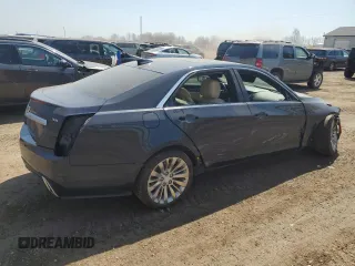 2019 Cadillac CTS Luxury AWD z VIN 1G6AX5SS1K0101825, wystawiony jako Copart lot #52970115 z przebiegiem 56 886 mil mil oraz Czysty tytuł • Clean title. Historia ofert i sprzedaży dostępna na DreamBid. Obrazek 3.