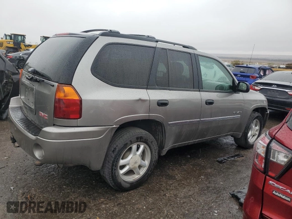 2006 GMC Envoy SLT with VIN 1GKDT13S262141598, listed as a Copart auction lot 45374304 with 258,039 mi miles and Salvage Title. Bid and sale history available at carsss.com. Image 3.
