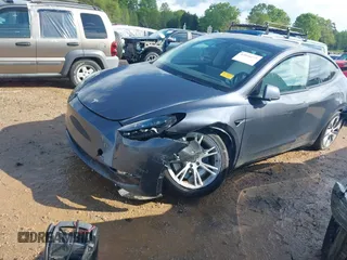 2023 Tesla Model Y Long Range with VIN 7SAYGDEE2PF674286, listed as a IAAI auction lot 42010275 with Not Provided miles and . Bid and sale history available at carsss.com. Image 17.