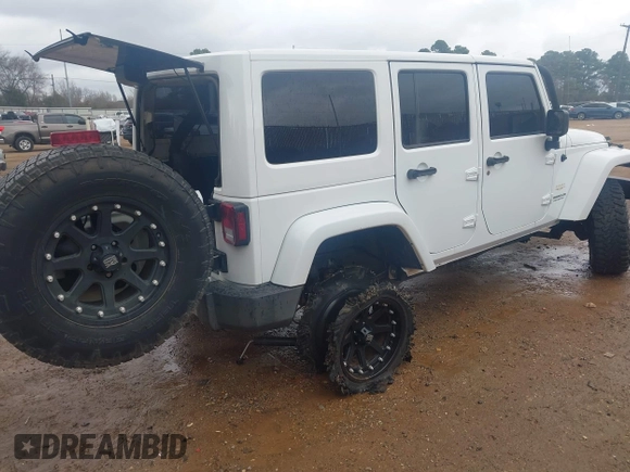2014 Jeep Wrangler Unlimited Sahara z VIN 1C4BJWEG6EL245986, wystawiony jako IAAI lot #41498492 z przebiegiem 125 882 mil mil oraz . Historia ofert i sprzedaży dostępna na DreamBid. Obrazek 4.