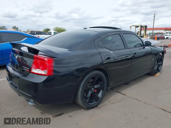 2009 Dodge Charger SRT-8 with VIN 2B3KA73W89H587394, listed as a IAAI auction lot 41795511 with 85,398 mi miles and . Bid and sale history available at carsss.com. Image 4.