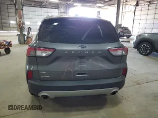 2021 Ford Escape SEL z VIN 1FMCU0H66MUB04206, wystawiony jako Copart lot #56638585 z przebiegiem Nie podano mil oraz Szkoda całkowita • Salvage title. Historia ofert i sprzedaży dostępna na DreamBid. Obrazek 6.