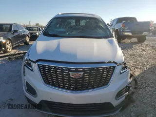 2024 Cadillac XT5 FWD Premium Luxury with VIN 1GYKNCRS7RZ740471, listed as a Copart auction lot 82275174 with 14,747 mi miles and Salvage Title. Bid and sale history available at carsss.com. Image 5.