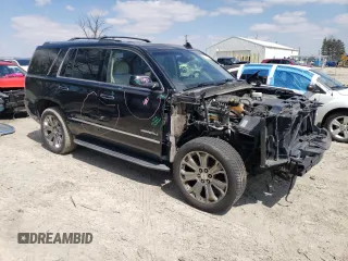 2015 GMC Yukon Denali with VIN 1GKS2CKJXFR702247, listed as a Copart auction lot 51648175 with 151,936 mi miles and Salvage Title. Bid and sale history available at carsss.com. Image 4.