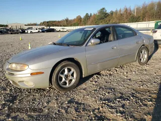 2001 Oldsmobile Aurora z VIN 1G3GR64H514125528, wystawiony jako Copart lot #81910664 z przebiegiem 117 926 mil mil oraz Tytuł czysty. Historia ofert i sprzedaży dostępna na DreamBid. Obrazek 1.