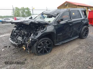 2018 Chevrolet Tahoe LT with VIN 1GNSCBKC2JR359681, listed as a IAAI auction lot 42287525 with 144,568 mi miles and . Bid and sale history available at DreamBid. Image 2.
