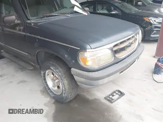 1998 Ford Explorer XL z VIN 1FMZU34X8WUC69252, wystawiony jako IAAI lot #42308913 z przebiegiem 140 858 mil mil oraz . Historia ofert i sprzedaży dostępna na DreamBid. Obrazek 6.