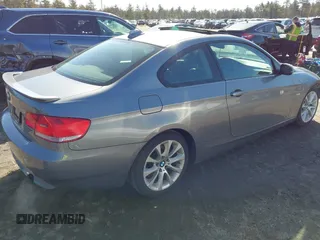 2009 BMW 3 Series 335i xDrive with VIN WBAWC73519E269820, listed as a IAAI auction lot 41794929 with 122,691 mi miles. Bid and sale history available at carsss.com. Image 4.