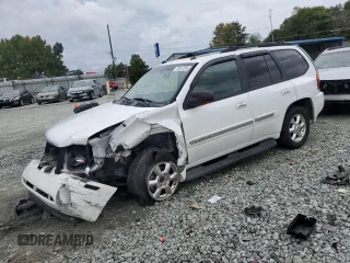 2005 GMC Envoy SLT with VIN 1GKDS13S652330496, listed as a Copart auction lot 73317234 with 191,138 mi miles and Salvage Title. Bid and sale history available at carsss.com. Image 1.