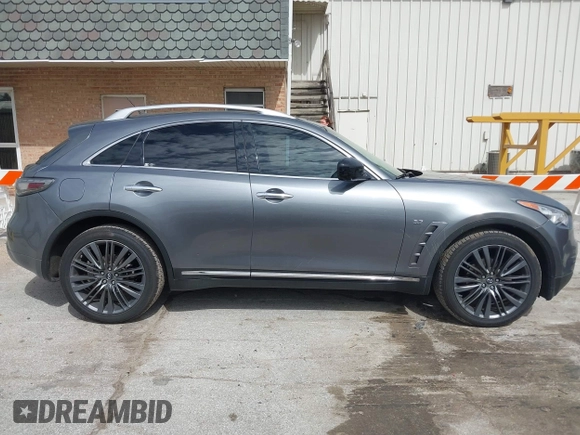 2017 Infiniti QX70 z VIN JN8CS1MW9HM412647, wystawiony jako IAAI lot #41830232 z przebiegiem 114 954 mil mil oraz . Historia ofert i sprzedaży dostępna na DreamBid. Obrazek 14.