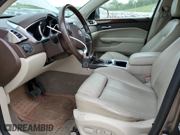 2011 Cadillac SRX Luxury Collection z VIN 3GYFNAEY8BS619208, wystawiony jako Copart lot #58321585 z przebiegiem 176 560 mil mil oraz Nie do naprawy • Non repairable. Historia ofert i sprzedaży dostępna na DreamBid. Obrazek 7.