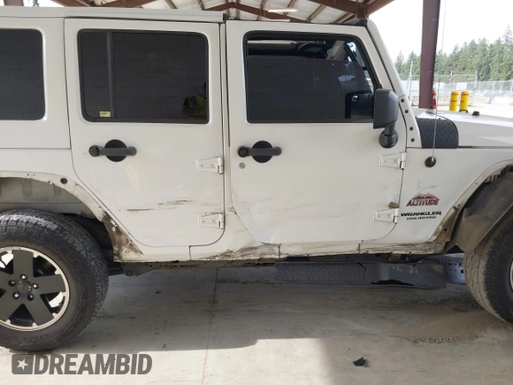 2012 Jeep Wrangler Unlimited Sahara with VIN 1C4BJWEG7CL275883, listed as a IAAI auction lot 42510764 with 149,531 mi miles and . Bid and sale history available at DreamBid. Image 6.