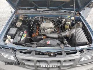 2001 Isuzu Rodeo with VIN 4S2CM57WX14307912, listed as a Copart auction lot 72416784 with 170,522 mi miles and Salvage title. Bid and sale history available at DreamBid. Image 12.