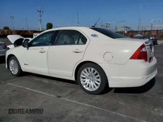 2012 Ford Fusion Hybrid z VIN 3FADP0L38CR171141, wystawiony jako Copart lot #61492425 z przebiegiem 275 312 mil mil oraz Czysty tytuł • Clean title. Historia ofert i sprzedaży dostępna na DreamBid. Obrazek 2.