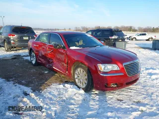 2012 Chrysler 300 Limited with VIN 2C3CCACG0CH205728, listed as a IAAI auction lot 41285693 with 125,204 mi miles. Bid and sale history available at carsss.com. Image 1.