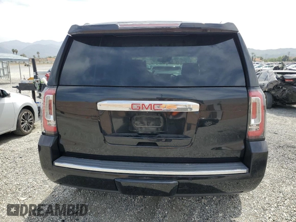 2015 GMC Yukon Denali z VIN 1GKS2CKJ9FR609462, wystawiony jako Copart lot #56685575 z przebiegiem 125 679 mil mil oraz Szkoda całkowita • Salvage title. Historia ofert i sprzedaży dostępna na DreamBid. Obrazek 6.