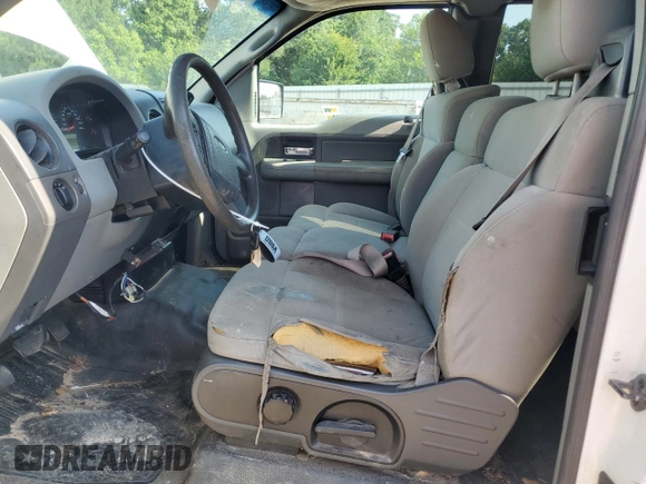 2007 Ford F-150 STX с VIN 1FTRX12W47FA95339, выставлен на аукционе Copart как лот 62309475 с пробегом 344 945 миль миль и Списание • Salvage title. История ставок и продаж доступна на DreamBid. Изображение 7.