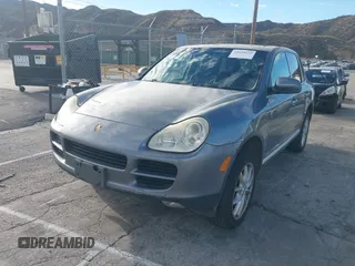 2004 Porsche Cayenne S with VIN WP1AB29P24LA72573, listed as a IAAI auction lot 41610225 with 143,280 mi miles. Bid and sale history available at carsss.com. Image 2.