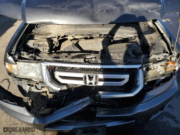 2011 Honda Ridgeline RTS with VIN 5FPYK1F47BB011036, listed as a Copart auction lot 77704604 with 0 mi miles and Salvage Title. Bid and sale history available at carsss.com. Image 11.