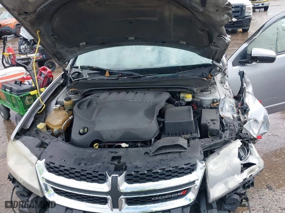2013 Dodge Avenger SXT with VIN 1C3CDZCG6DN709625, listed as a IAAI auction lot 41708077 with 219,670 mi miles. Bid and sale history available at carsss.com. Image 10.