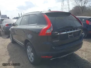 2016 Volvo XC60 T6 with VIN YV4902RK5G2775901, listed as a IAAI auction lot 41797196 with 138,609 mi miles. Bid and sale history available at carsss.com. Image 3.