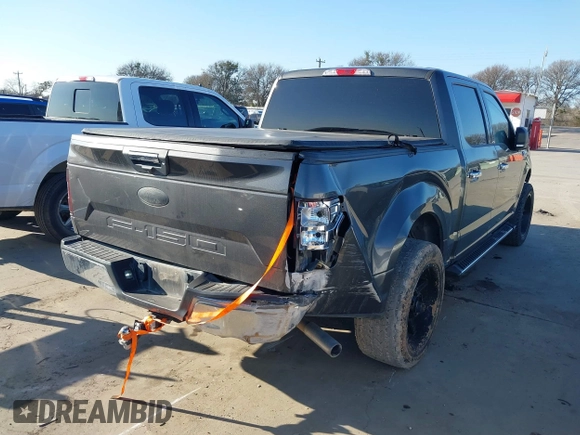2019 Ford F-150 XL with VIN 1FTEW1CB3KKC43753, listed as a IAAI auction lot 41036512 with 108,257 mi miles and . Bid and sale history available at carsss.com. Image 4.