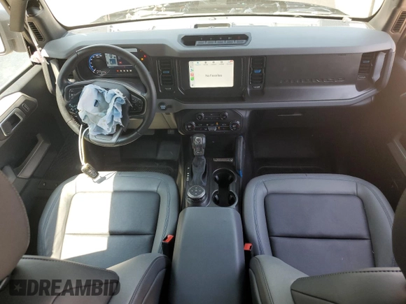 2023 Ford Bronco с VIN 1FMEE5DH2PLB21489, выставлен на аукционе Copart как лот 60690365 с пробегом 14 326 миль миль и Списание • Salvage title. История ставок и продаж доступна на DreamBid. Изображение 8.