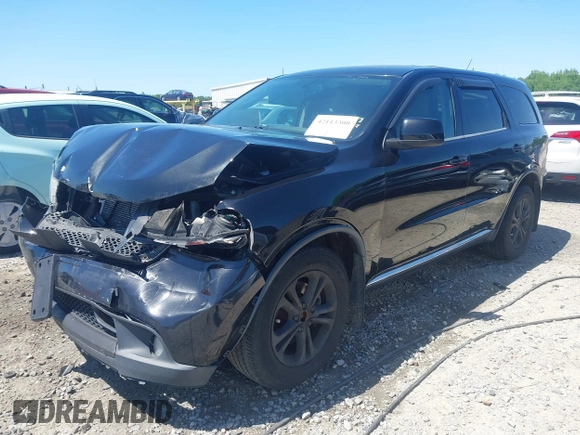 2013 Dodge Durango SXT with VIN 1C4RDJAG8DC617759, listed as a IAAI auction lot 42113300 with 185,152 mi miles and . Bid and sale history available at DreamBid. Image 20.