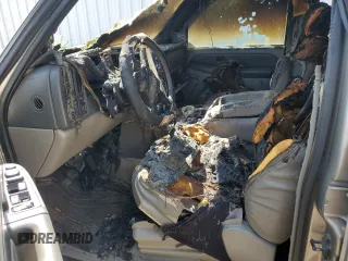2003 Chevrolet Tahoe LS with VIN 1GNEC13Z73J108781, listed as a Copart auction lot 59370715 with Not provided miles and Salvage title. Bid and sale history available at DreamBid. Image 7.