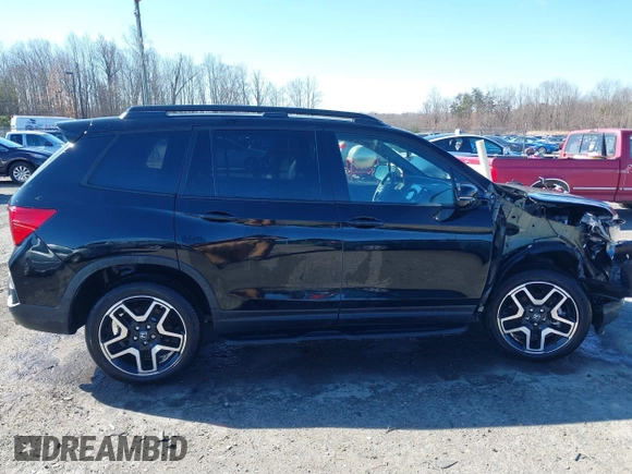 2023 Honda Passport Elite with VIN 5FNYF8H04PB006514, listed as a IAAI auction lot 41537826 with 14,640 mi miles and . Bid and sale history available at DreamBid. Image 14.