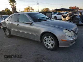 2005 Mercedes-Benz E-Class 3.2L with VIN WDBUF65J95A712625, listed as a Copart auction lot 82050834 with 327,844 mi miles and Salvage Title. Bid and sale history available at carsss.com. Image 4.