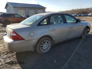 2005 Ford Ocean z VIN 1FAHP23145G161504, wystawiony jako Copart lot #44732275 z przebiegiem 139 653 mil mil oraz Szkody całkowita. Historia ofert i sprzedaży dostępna na DreamBid. Obrazek 3.