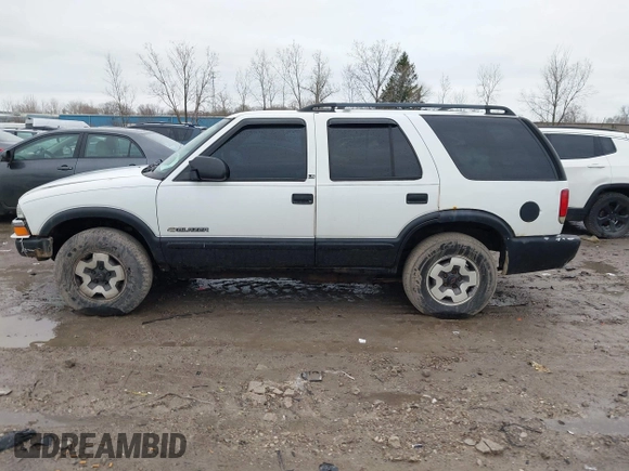 2003 Chevrolet Blazer LS z VIN 1GNDT13X63K106315, wystawiony jako IAAI lot #41914116 z przebiegiem 196 774 mil mil oraz . Historia ofert i sprzedaży dostępna na DreamBid. Obrazek 14.