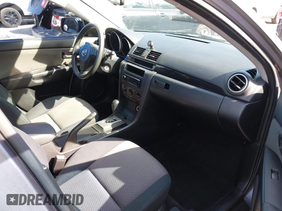 2006 Mazda 3 i with VIN JM1BK12F461530369, listed as a IAAI auction lot 41990008 with 169,878 mi miles. Bid and sale history available at carsss.com. Image 5.