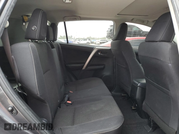 2018 Toyota RAV4 XLE with VIN JTMWFREV1JJ742694, listed as a Copart auction lot 51093695 with 74,502 mi miles and Salvage Title. Bid and sale history available at DreamBid. Image 11.